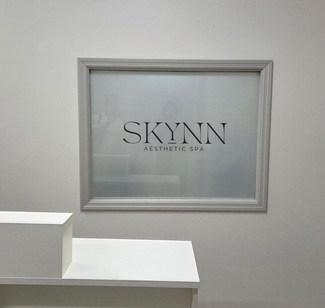 Skynn Aesthetic Spa - Frosted Glass Window with logo